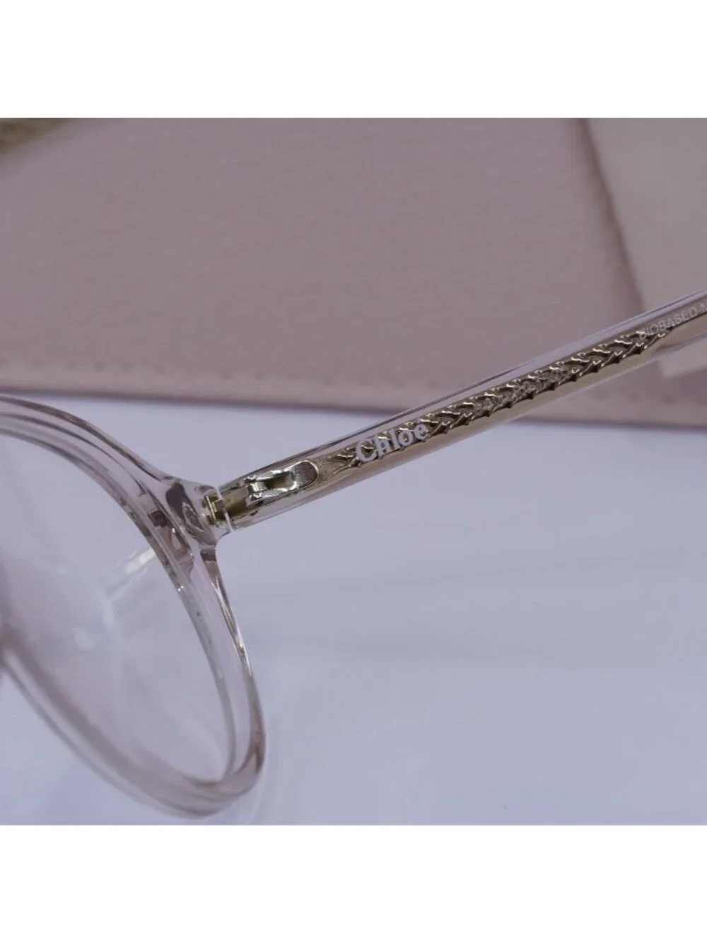 Chloe CH0012OA 001 Round Eyeglasses 50mm - Transparent Pink